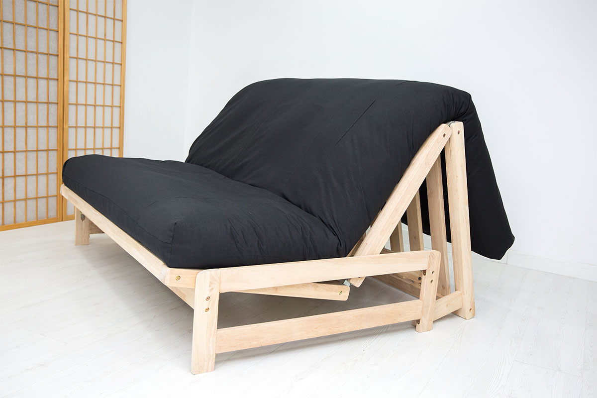 Sofá cama A-Frame de madera ecológica 140x200. Convertible práctico y compacto, ideal para futones. Acabado natural sin barniz. Perfecto para invitados.
